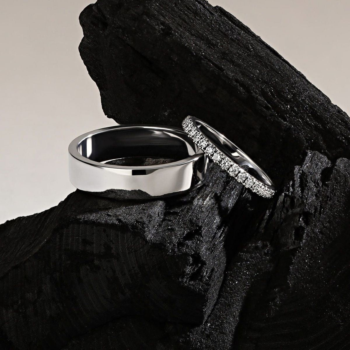 Close-up of an ear adorned with a set of elegant gold and diamond earrings