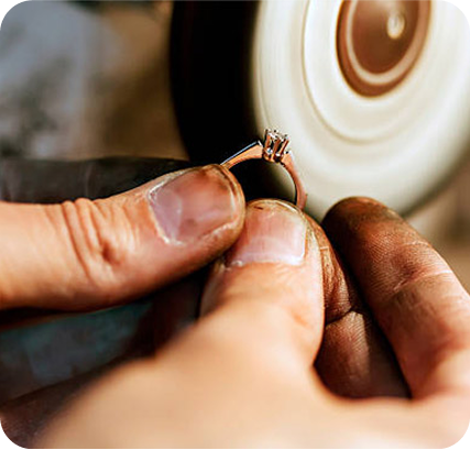 Craftsman handling casting tools for jewellery production